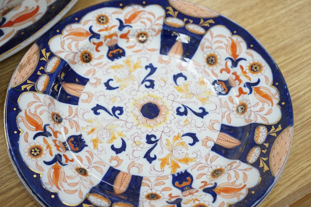 Fifteen items of a mid 19th century Mason's/Ashworth’s ironstone dinner service. Oval meat platter 48.5cm wide. Condition - three plates chipped, some losses to gilding